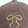 Gorra de béisbol infantil de mezclilla con moño