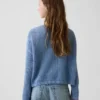 Jerséu infantil de ganchillo oversize con estampado