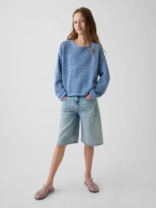 Jerséu infantil de ganchillo oversize con estampado