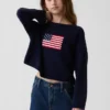 Jerséu infantil de ganchillo oversize con motivos americanos
