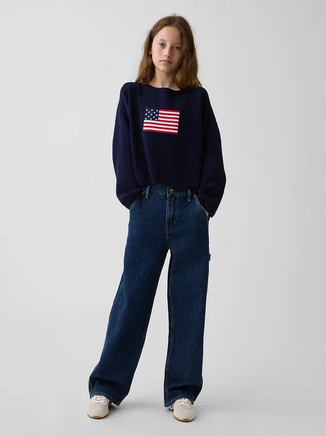 Jerséu infantil de ganchillo oversize con motivos americanos