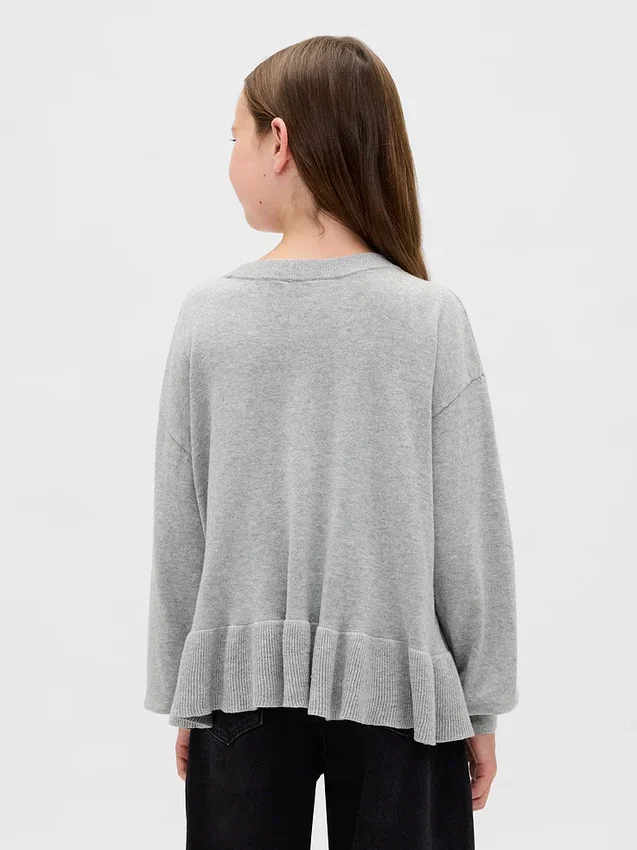 Jerséu infantil holgado con peplum