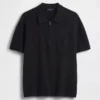 Jerséu polo oversize con bolsillo y cremallera de un cuarto