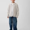 Jerséu tipo polo holgado para niños