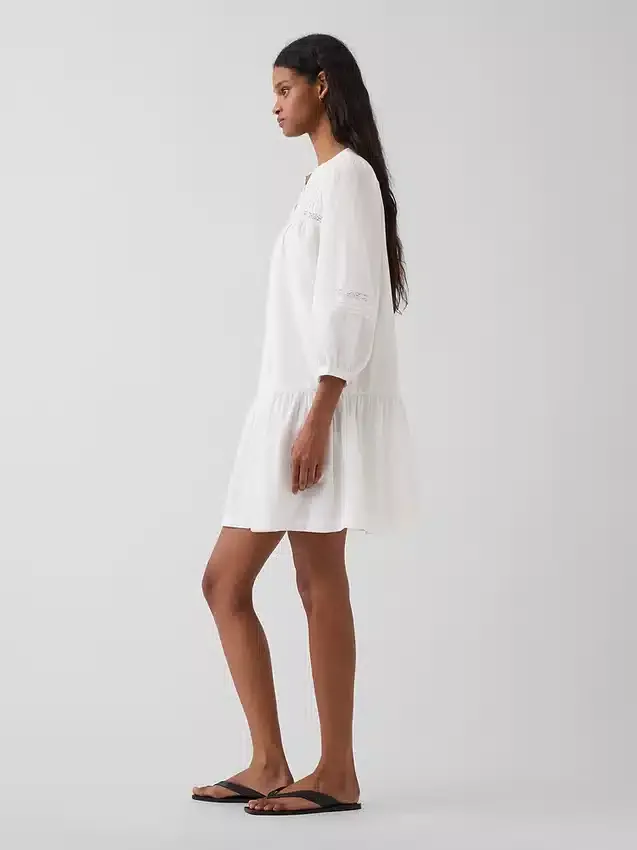 Mini vestido de cintura baja con ribete de encaje