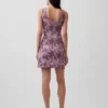 Mini vestido floral con cuello de barco y espalda abierta