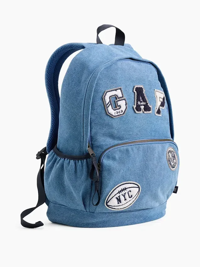 Mochila infantil de mezclilla con parches de logotipos