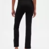 Pantalones acampanados de doble tejido con tiro alto y dobladillo abierto