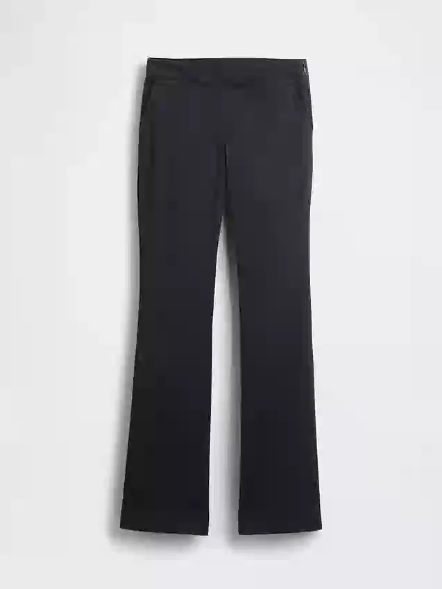 Pantalones caqui ajustados de tiro bajo y corte acampanado