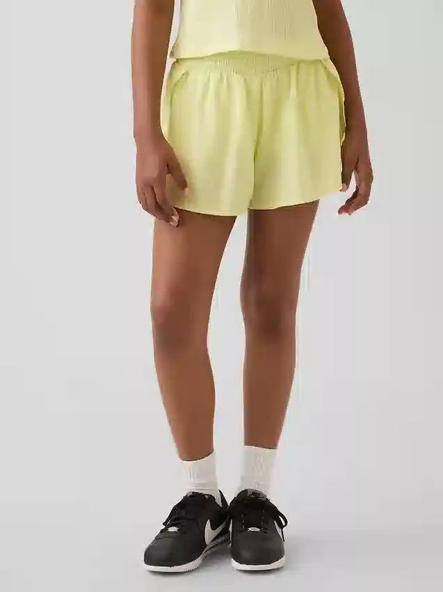 Pantalones cortos de correr para niños de secado rápido con dobladillo de mariposa