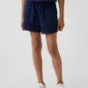 Pantalones cortos fáciles de poner para niños de lino y algodón con ribete de encaje