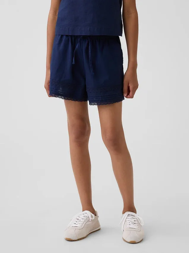 Pantalones cortos fáciles de poner para niños de lino y algodón con ribete de encaje