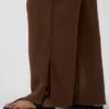 Pantalones de gasa de algodón con dobladillo abierto