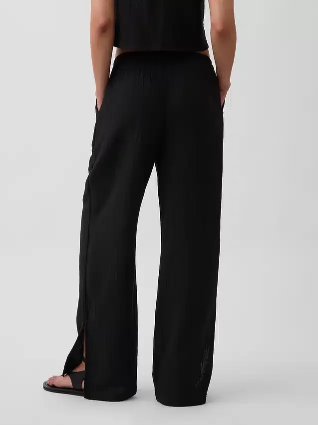 Pantalones de gasa de algodón con dobladillo abierto