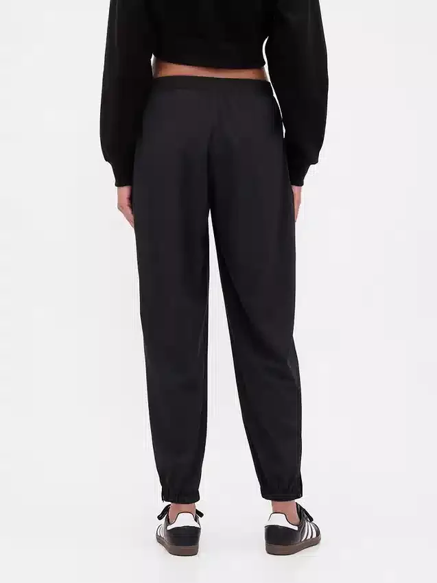 Pantalones de jogging GapFit Tech de talle alto con cremallera en el dobladillo