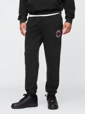 Pantalones de jogging gruesos con el logotipo de los Toronto Raptors de la NBA