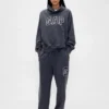 Pantalones de sudadera para adultos de tejido grueso y corte holgado con logo