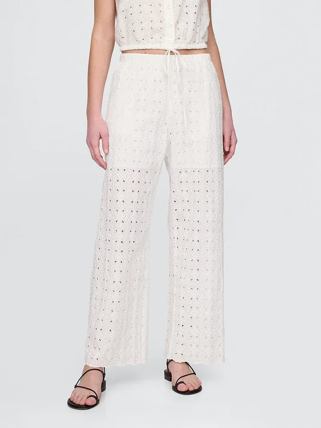 Pantalones de tiro medio con ojales y corte ancho