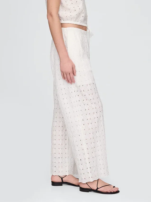 Pantalones de tiro medio con ojales y corte ancho