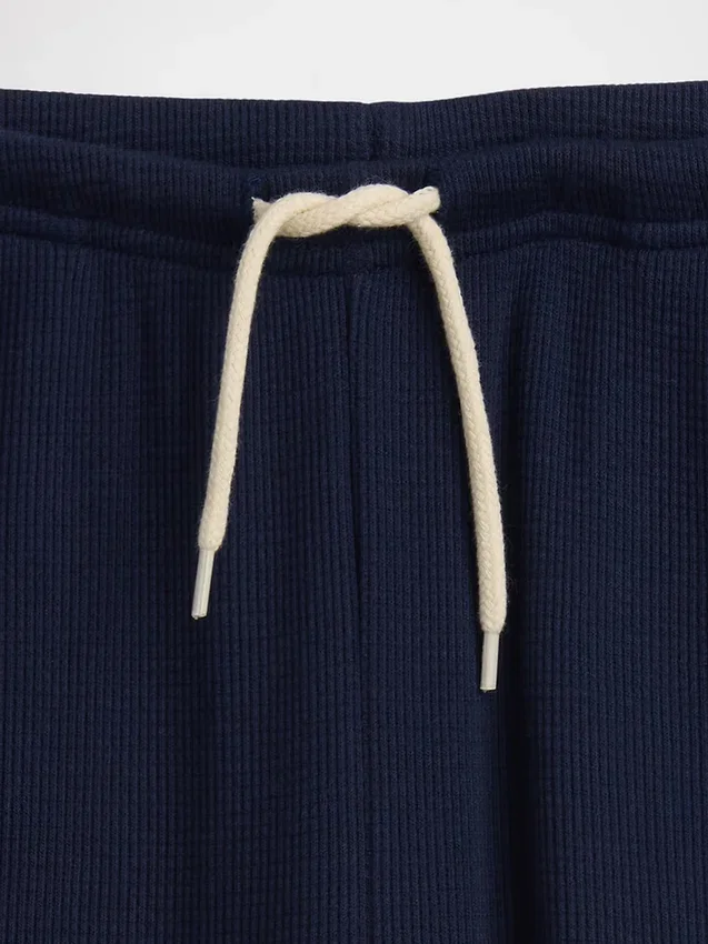 Pantalones infantiles holgados de punto waffle con pierna ancha