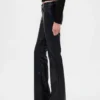Pantalones largos y ajustados de cuero vegano reciclado de talle bajo