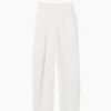 Pantalones plisados de talle alto con corte en arco de GAP × Victoria Beckham