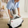 Paquete de cuna de viaje Babybjorn Light y sábana ajustable
