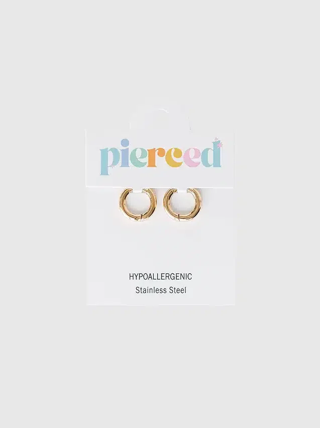 Pendientes Huggie de oro de 8 mm de Pierced Co