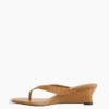 Sandalias de cuña con tiras entre los dedos de cuero vegano
