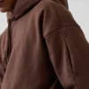 Sudadera con capucha de viaje para adultos GAP × Béis, de tejido grueso