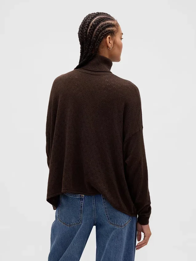 Suéter de cuello alto oversize con punto calado