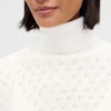 Suéter de cuello alto oversize con punto calado