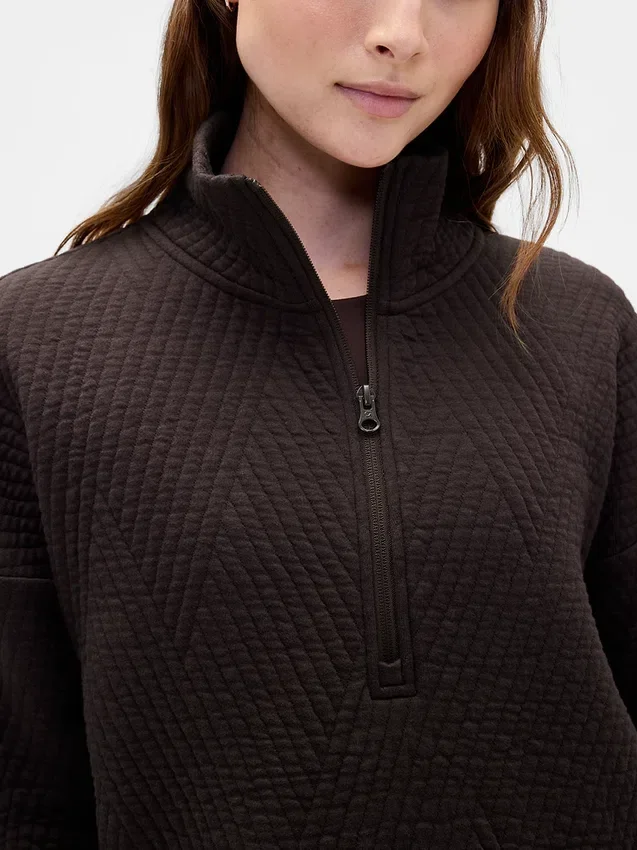 Suéter GapFit de jacquard acolchado con media cremallera