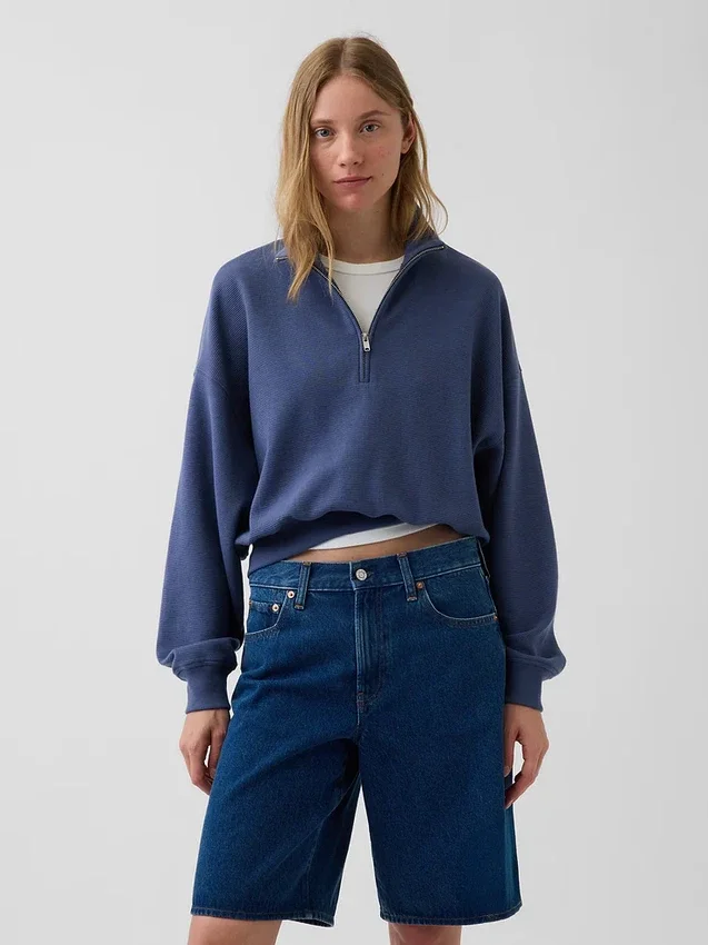 Suéter oversize de algodón texturizado con media cremallera
