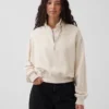 Suéter oversize de algodón texturizado con media cremallera
