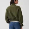 Suéter oversize de algodón texturizado con media cremallera