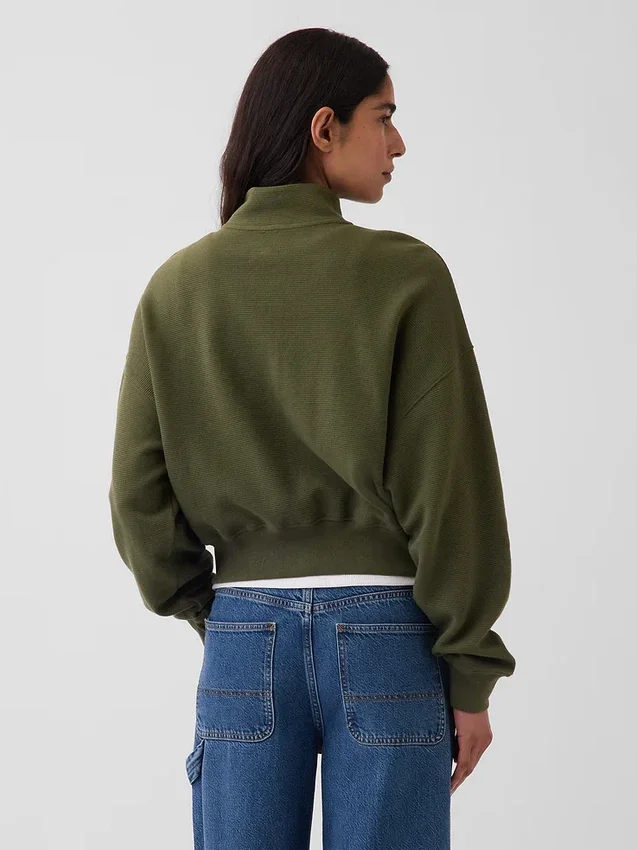 Suéter oversize de algodón texturizado con media cremallera