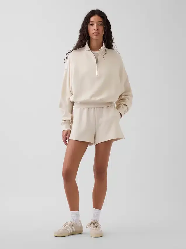 Suéter oversize de algodón texturizado con media cremallera