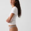 Tanga de algodón orgánico elástico con ribete de encaje