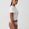 Tanga de algodón orgánico elástico con ribete de encaje