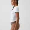 Tanga de algodón orgánico elástico con ribete de encaje