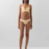Tanga de algodón orgánico elástico con ribete de encaje