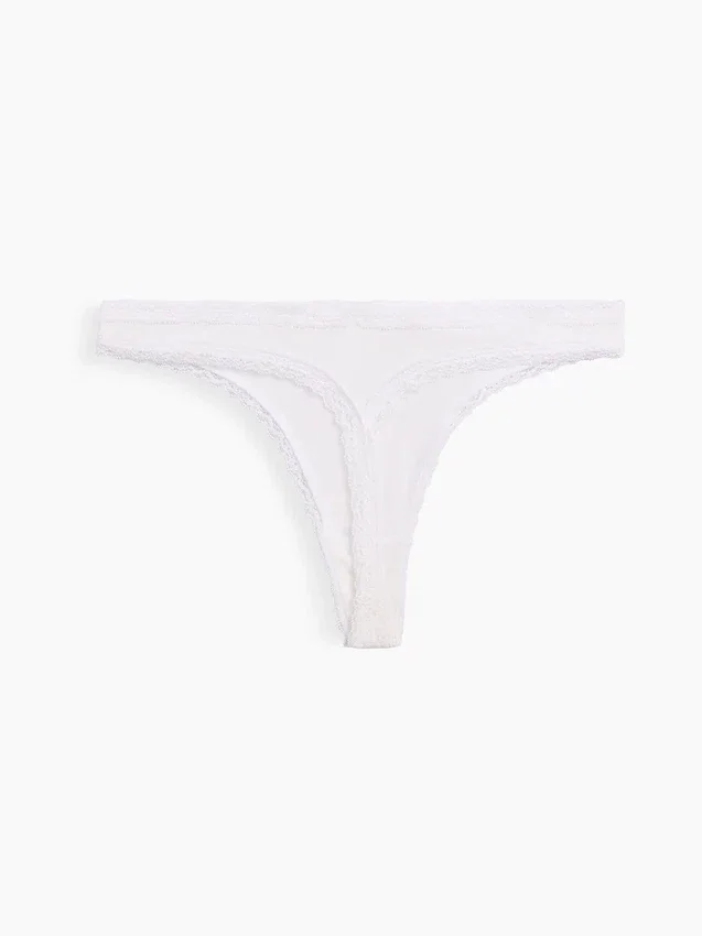 Tanga de algodón orgánico elástico con ribete de encaje
