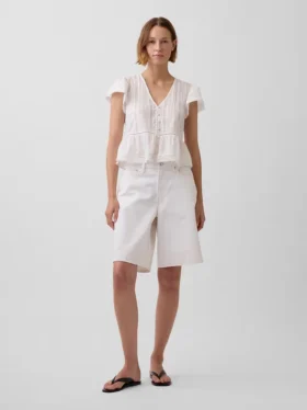 Top corto con peplum de gasa de encaje