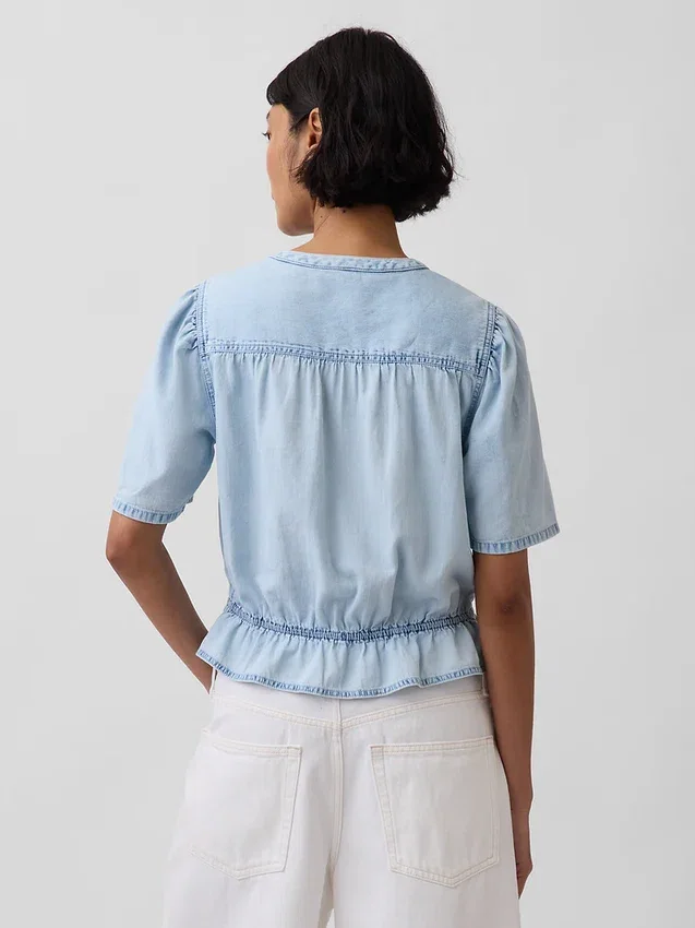 Top corto de denim con peplum
