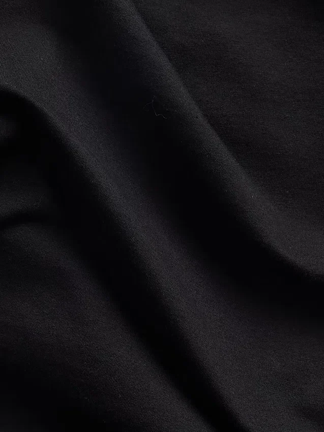 Top corto fruncido de jersey de punto tupido