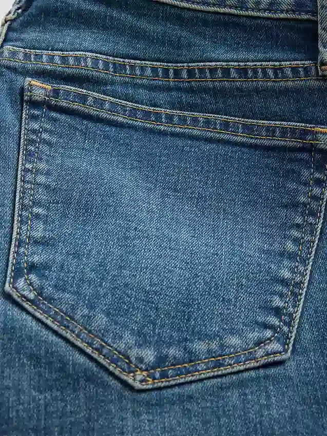 Vaqueros Curvy de talle bajo, largos y ajustados