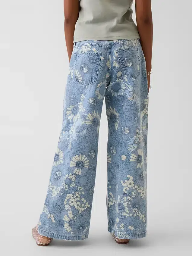 Vaqueros de mezclilla holgados de talle bajo con estampado floral para niños