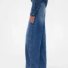 Vaqueros de talle alto con corte arqueado de GAP × Victoria Beckham