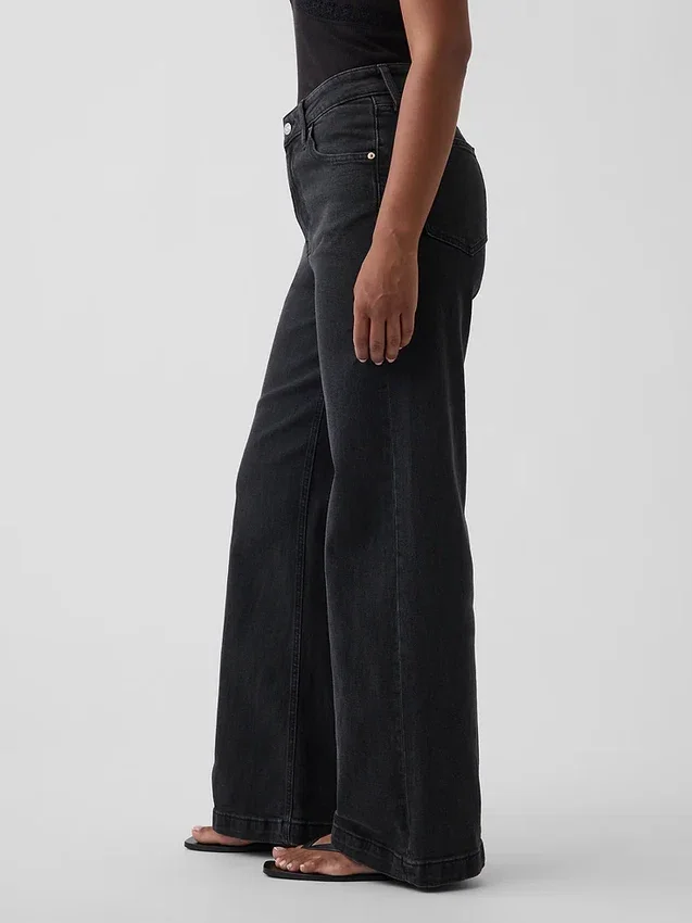 Vaqueros de talle alto, corte curvilíneo y pierna ancha